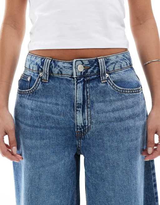 ASOS DESIGN Petite soft wide leg jeans in midwash blue