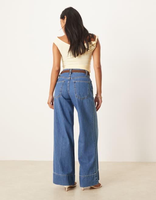 ASOS DESIGN Petite wide leg jeans with crease front and belt in dark mid wash
