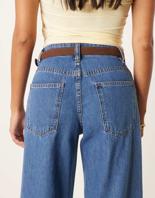 ASOS DESIGN Petite wide leg jeans with crease front and belt in dark mid wash