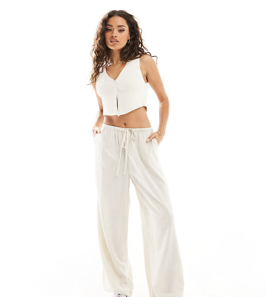 ASOS DESIGN Petite wide leg pull on trouser with linen in natural-Neutral