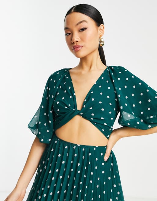 ASOS DESIGN Petite wrap around pleated mini dress in green white spot print