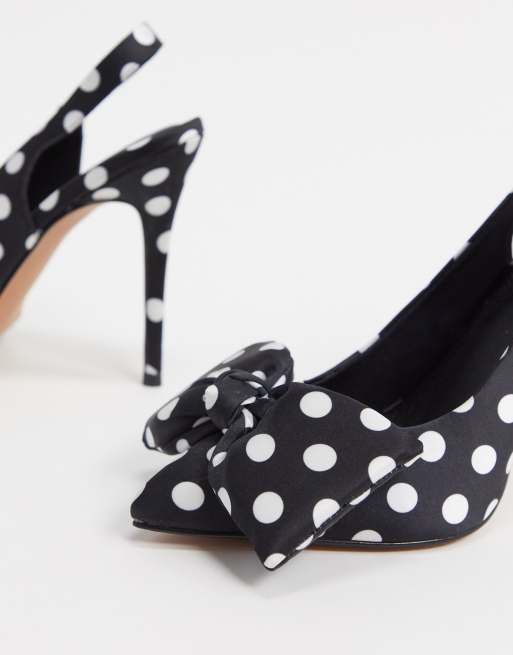 scarpe a pois bianche e nere