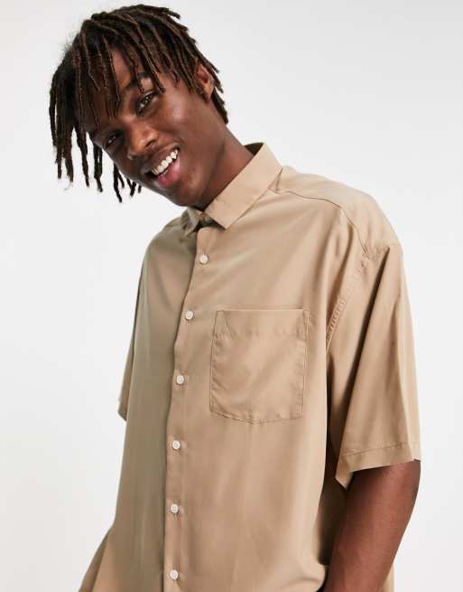 ASOS DESIGN – Piaskowobeżowa koszula oversize z modalu z krótkimi rękawami, o luźnym kroju i z efektem sprania