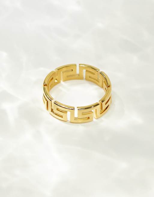 ASOS DESIGN – Pierścionek z wodoodpornej stali nierdzewnej w kolorze złota z wycinanym greckim wzorem