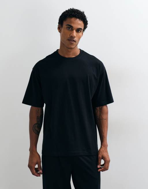 ASOS DESIGN pink panther pyjama set in black, 2 of 4