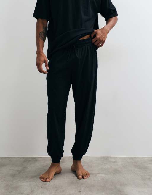 ASOS DESIGN pink panther pyjama set in black, 4 of 4