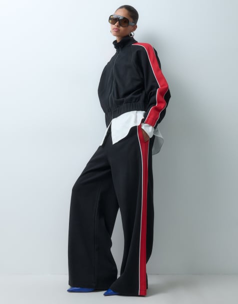 ASOS DESIGN pique sporty panel sweatpants in red and black - view 1