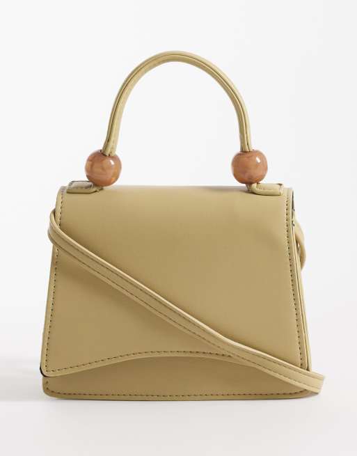 ASOS DESIGN - Pistaciegrøn crossbody-taske med kugleformet resinhåndtag øverst og aftagelig rem