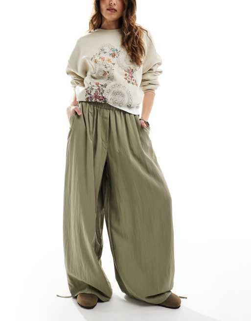 ASOS DESIGN – Pistagegröna byxor med supervida ben och knytning i midjan