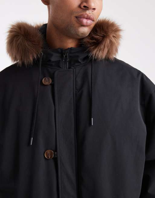 ASOS DESIGN - Piumino oversize con cappuccio con bordo in pelliccia sintetica nero, 5 di 5