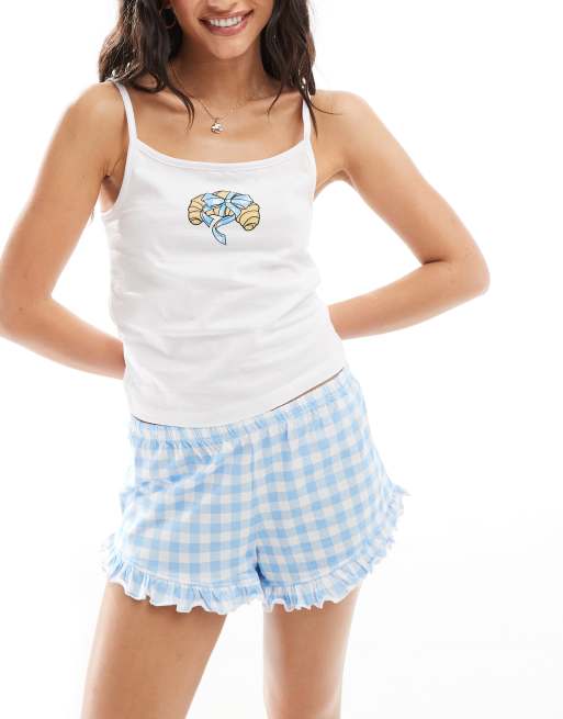 ASOS DESIGN – Piżama: top na ramiączkach z motywem rogalika i szorty z falbanką