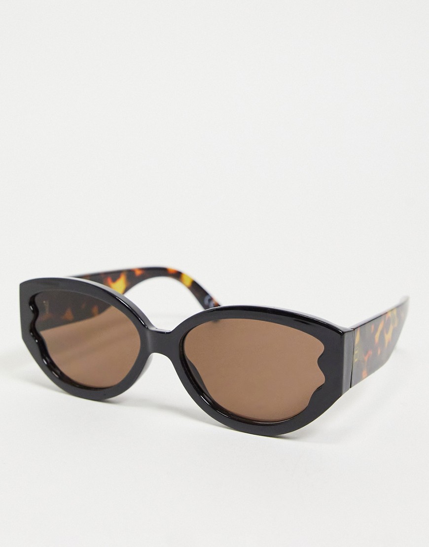 ASOS DESIGN plastic oval sunglasses with tort arms in black