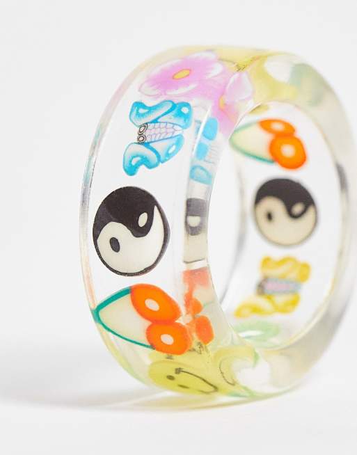 ASOS DESIGN plastic ring with trapped kitsch charms in clear, 3 of 4
