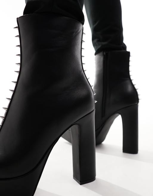 ASOS DESIGN platform heeled boots with pointed toe in black faux leather with studs ASOS