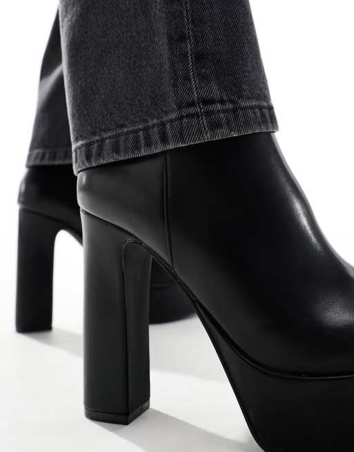 ASOS DESIGN platform heeled boots with pointed toe in black faux leather