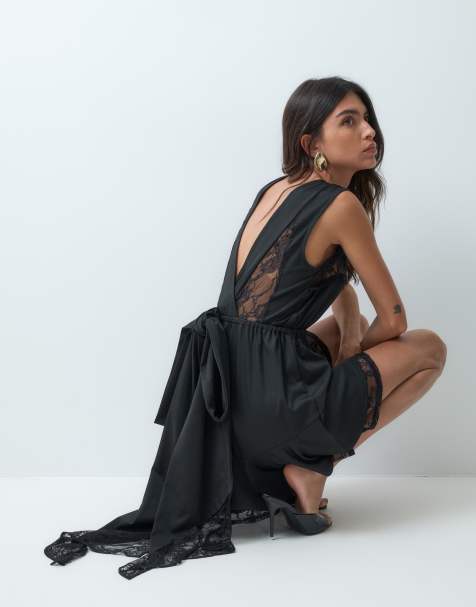 ASOS DESIGN playsuit med spetskant och volym, med rosett i ryggen, i svart - view 1