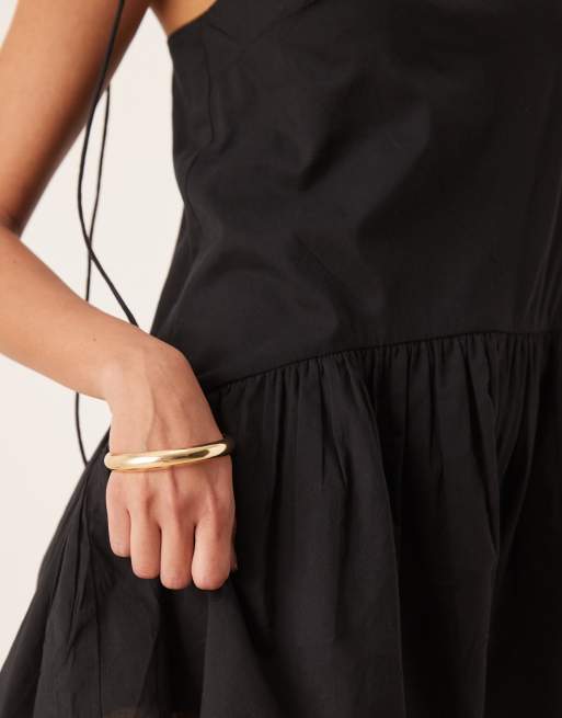 ASOS DESIGN - Playsuit met dunne bandjes en verlaagde taille en volle rok in zwart, 3 van 4