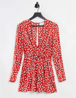 ASOS DESIGN - Playsuit met gedraaide voorkant, lange mouwen en klaprozenprint