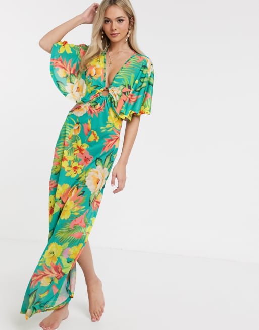 ASOS DESIGN – Plażowa sukienka maxi z dżerseju z ozdobnym pierścieniem i nadrukiem w duże tropikalne kwiaty