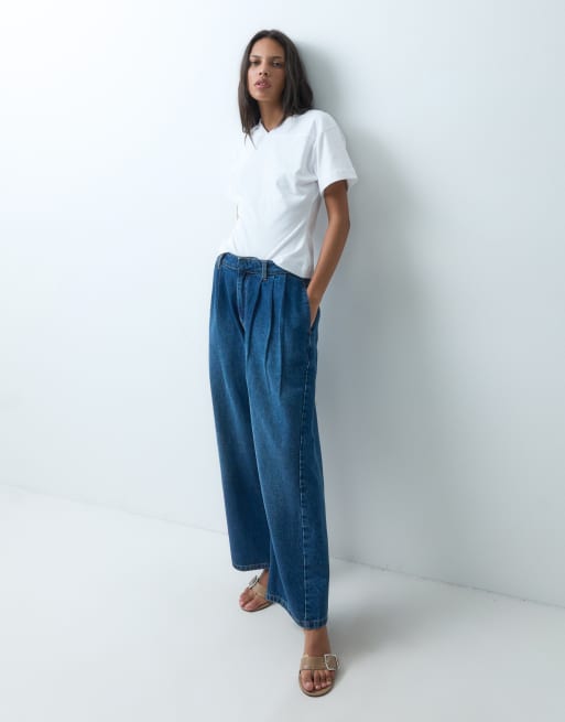 ASOS DESIGN pleat front horseshoe jean in mid authentic blue, 4 of 5