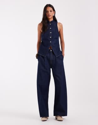Asos Design Pleat Front Horseshoe Jeans In Navy