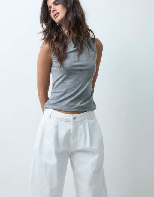 ASOS DESIGN pleat front horseshoe jeans in white, 4 of 5