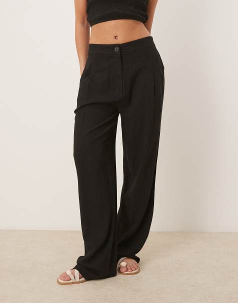 ASOS DESIGN pleat front tapered pants with linen in black - view 1