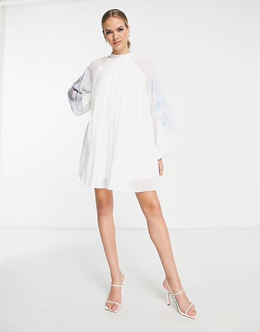 ASOS DESIGN pleated babydoll mini dress with oversized cutwork sleeve in  white