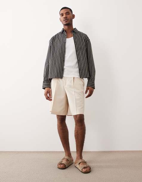 ASOS DESIGN pleated bermuda dress shorts in ecru - view 1