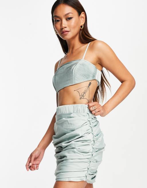 ASOS DESIGN pleated bralette and ruched mini skirt set with button side in  mint