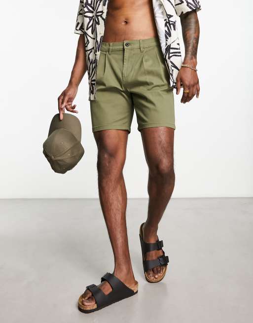 ASOS DESIGN pleated shorts in mid length in tan