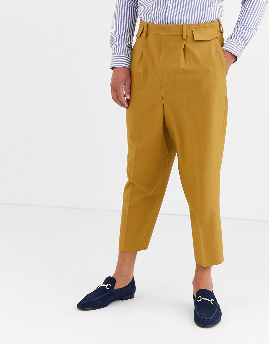 ASOS DESIGN pleated drop crotch tapered smart trousers with pocket flaps in camel-Beige
