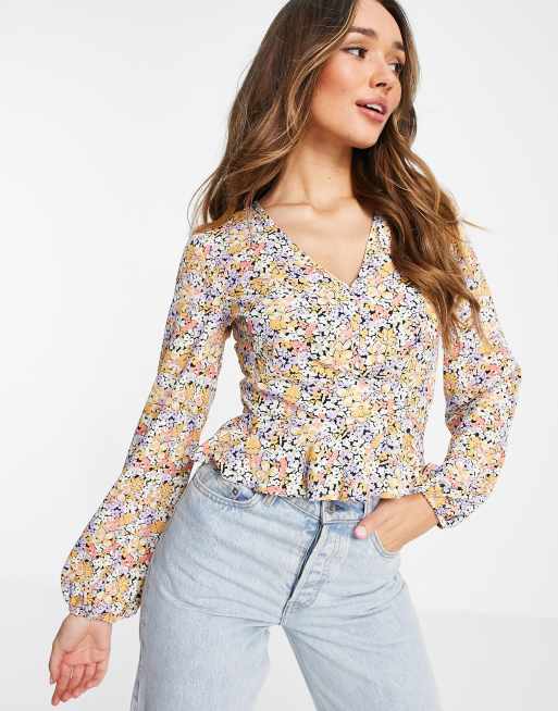 ASOS DESIGN pleated front top with long sleeves and peplum hem in floral ditsy print