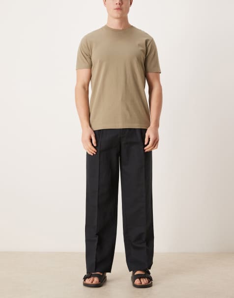 ASOS DESIGN pleated linen rich wide leg dress pants in black - view 1