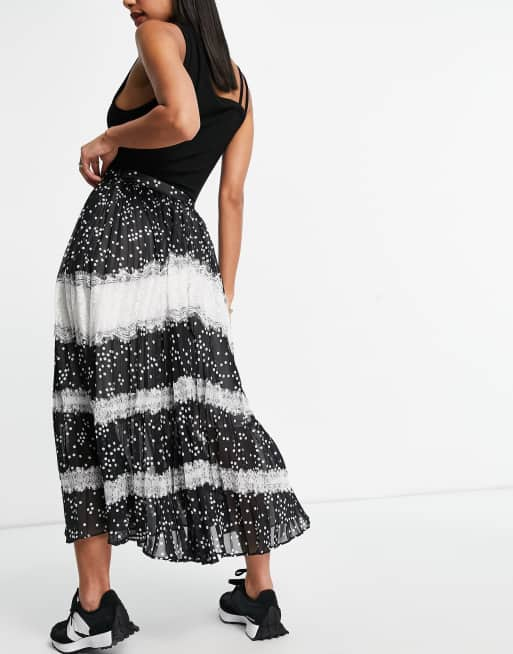 ASOS DESIGN pleated midi skirt with lace detail in mono spot