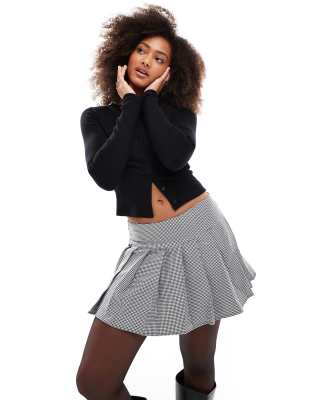 pleated mini skirt in black & white plaid-Multi