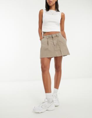 pleated mini skirt in washed sand-Pink