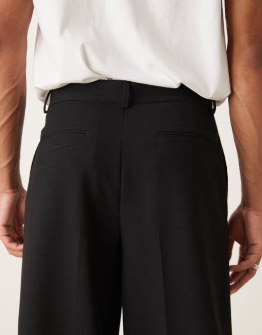ASOS DESIGN pleated oversized tapered dress pants in black microtexture