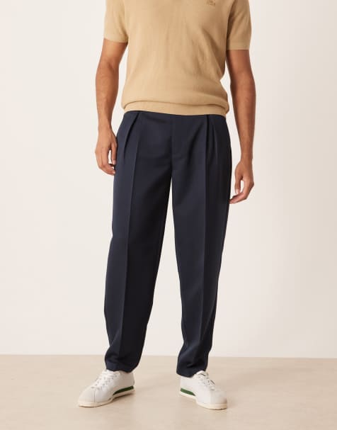 ASOS DESIGN pleated oversized tapered dress pants in navy - view 1