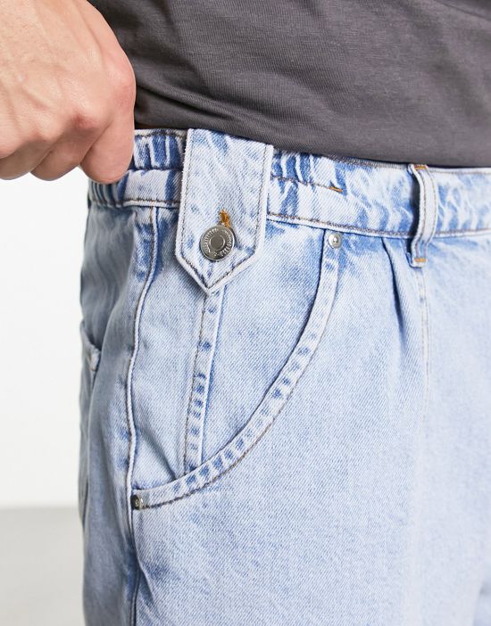 https://images.asos-media.com/products/asos-design-pleated-regular-length-denim-shorts-in-light-wash-blue/204311020-3?$n_550w$&wid=550&fit=constrain