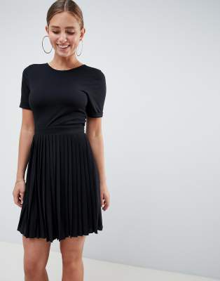black dress with pleated skirt