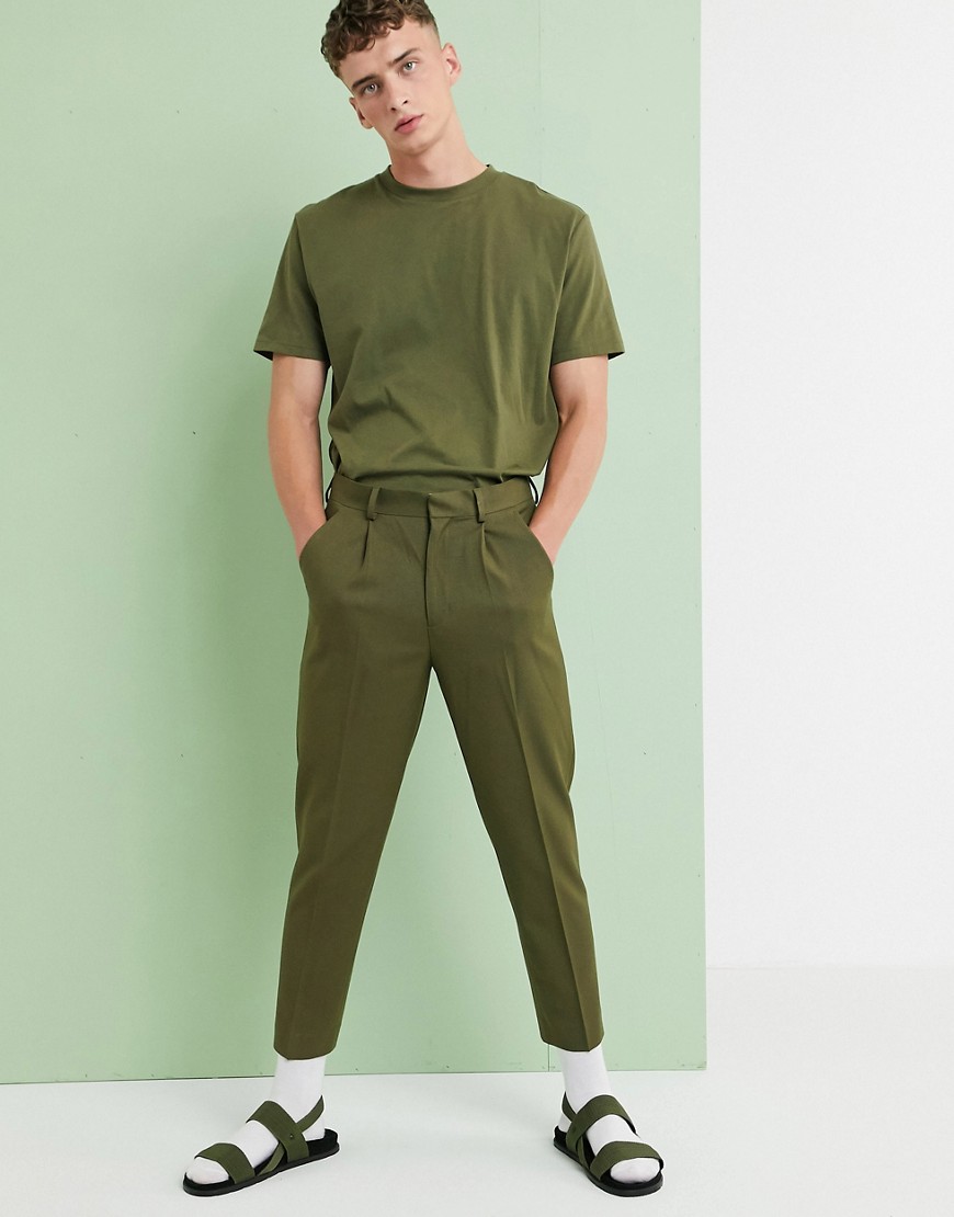 ASOS DESIGN pleated tapered crop smart trousers in olive green