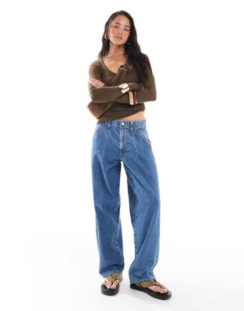 ASOS DESIGN pleated tapered jeans in clean mid blue - view 1