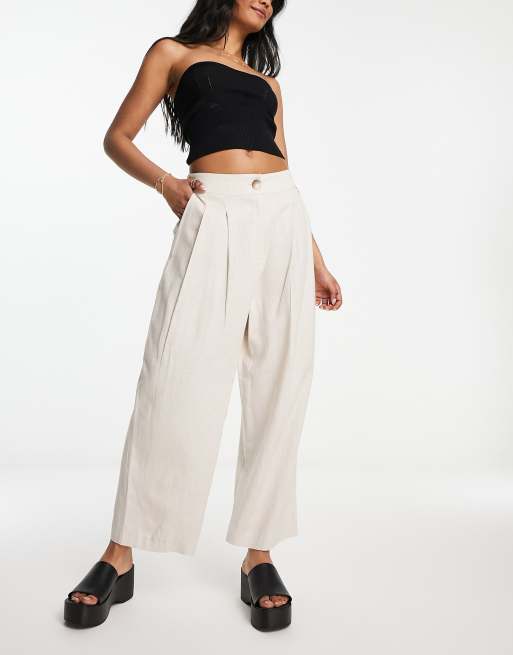 ASOS DESIGN pleated tapered pants with linen in stone | ASOS