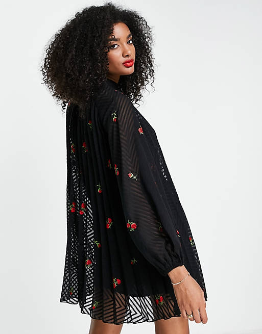 Dresses pleated trapeze mini dress with all over embroidery in black 