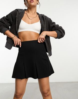 pleated twill mini skirt in black