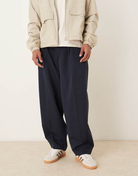 ASOS DESIGN pleated wide barrel leg dress pants in navy - view 1