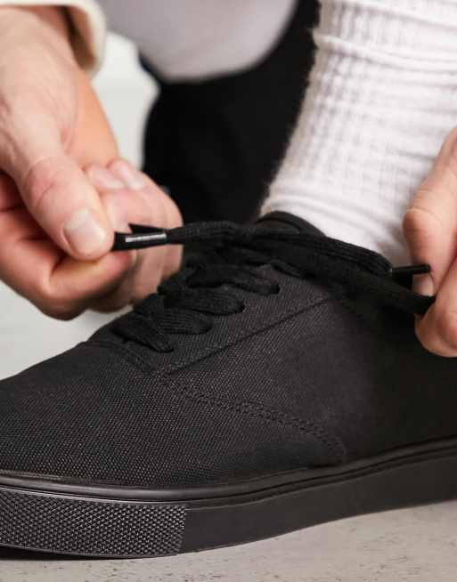 All black store plimsolls mens