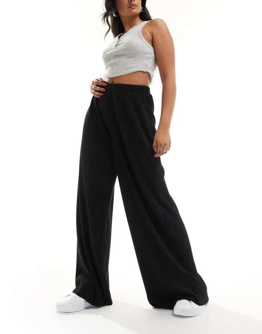 ASOS DESIGN - Plissé broek met wijde pijpen in zwart