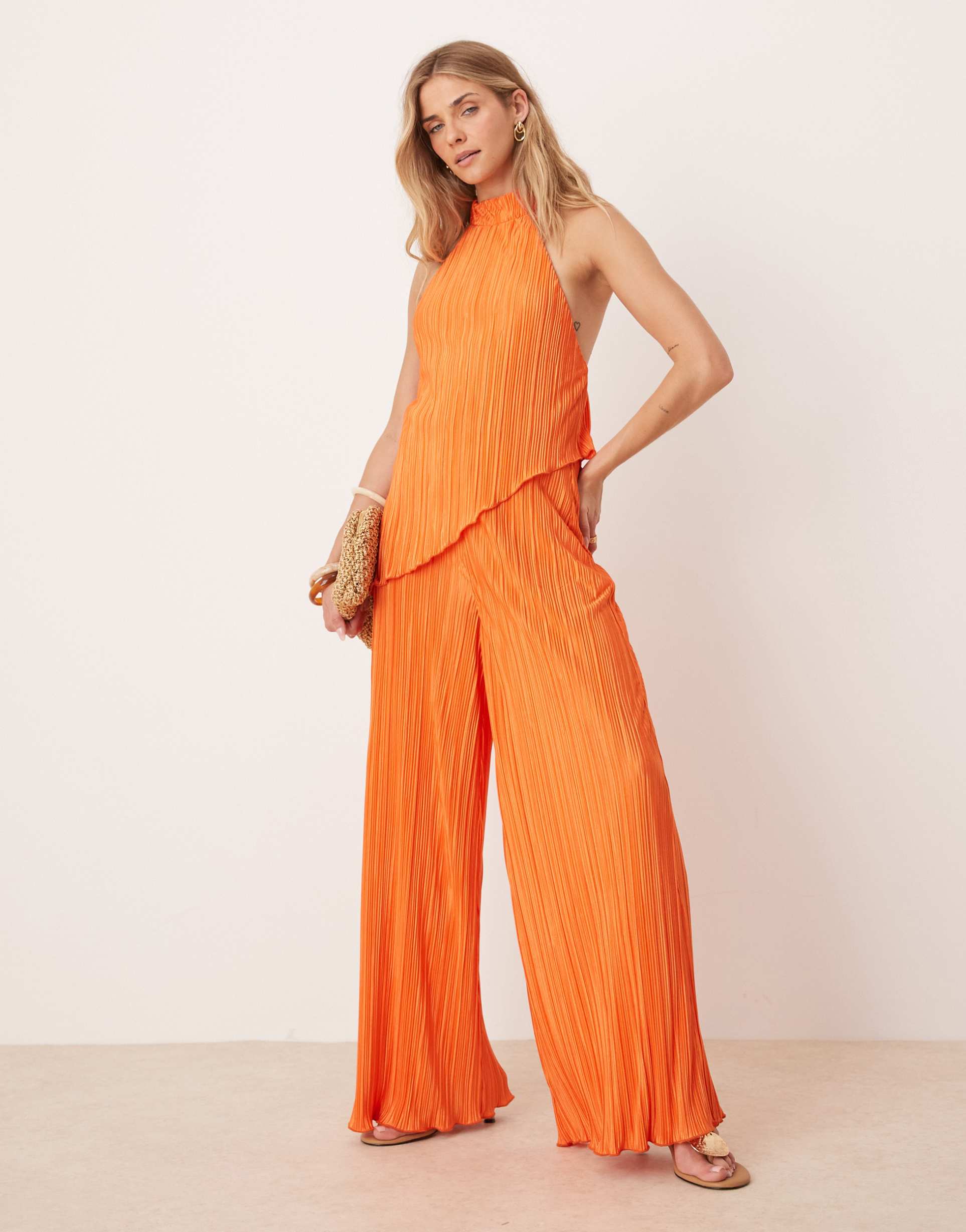 asos design plisse halter neck wide leg jumpsuit in orange
